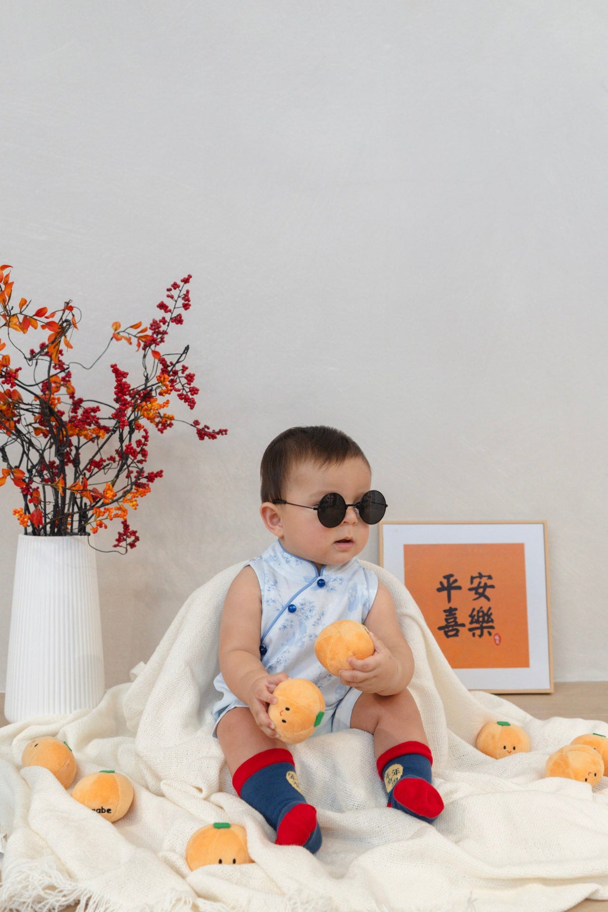 baby boy in oriental cheongsam playsuit
